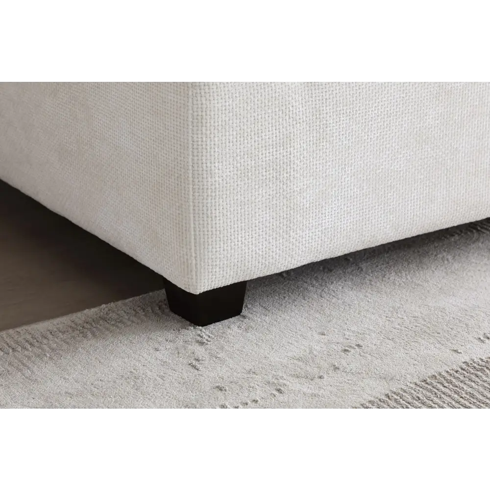 White upholstered corner of modular sectional sofa in linen fabric package quantity