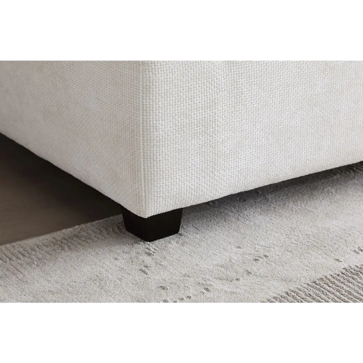 White upholstered corner of modular sectional sofa in linen fabric package quantity