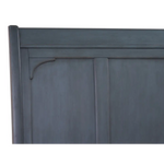 Blue wooden headboard detail with corduroy blue finish on Americana King Sleigh Bed