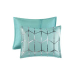 Turquoise decorative pillows included in the Aqua Silver Geometric Twin Comforter Set
