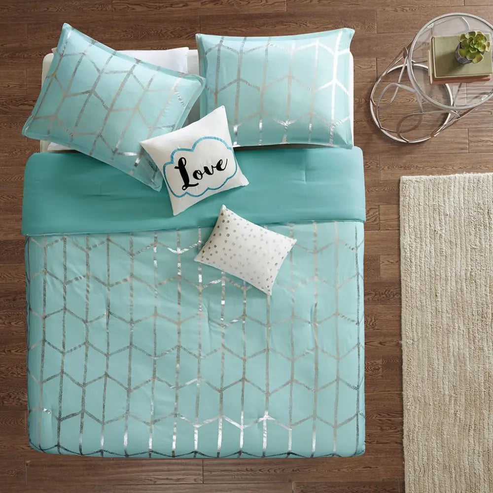 Aqua and silver geometric bedding set with decorative pillows from the comforter set collection