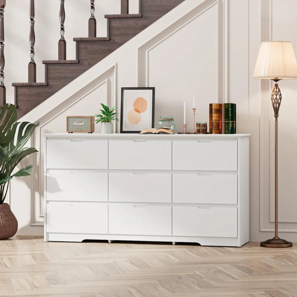 White nine-drawer bedroom dresser with anti-toppling device and wide top for safety