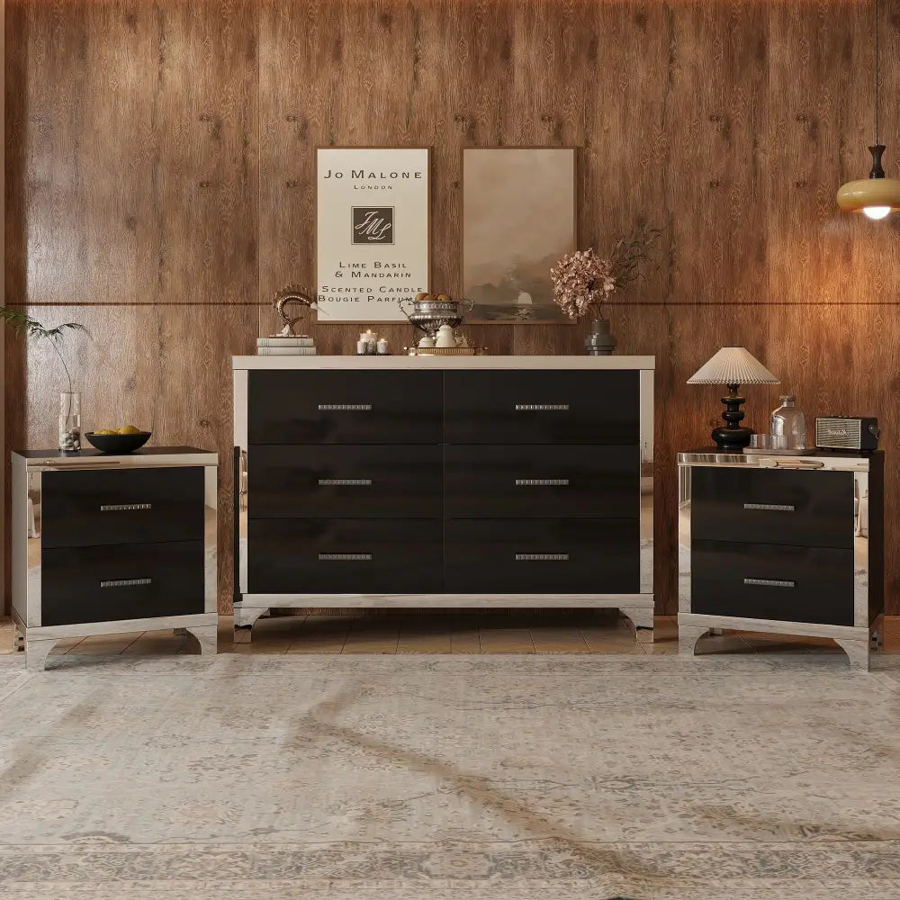 Bedroom set with mirrored accents featuring spacious drawers and sleek metal handles