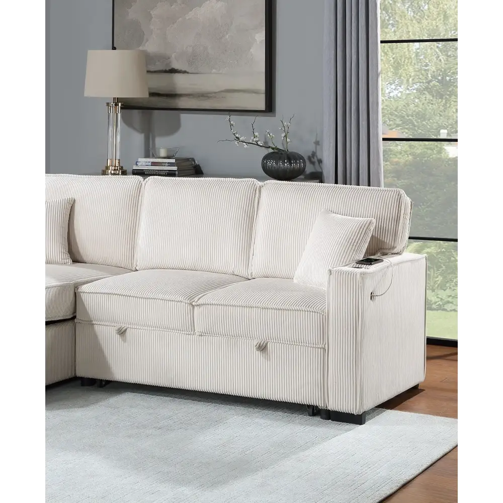 White corduroy sectional sofa with reversible chaise w storage and pull-out bed