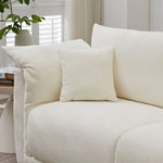 Textured white sofa with pillows featuring a sturdy wood frame and package size details