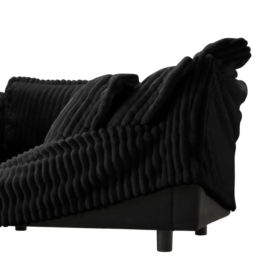 Black corduroy fabric deep seat modern sofa showcasing textured upholstery for contemporary living rooms