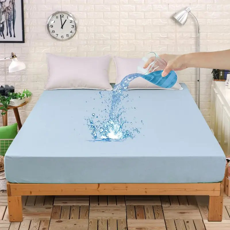 Blue waterproof fitted sheet designed for bedding protection and durability