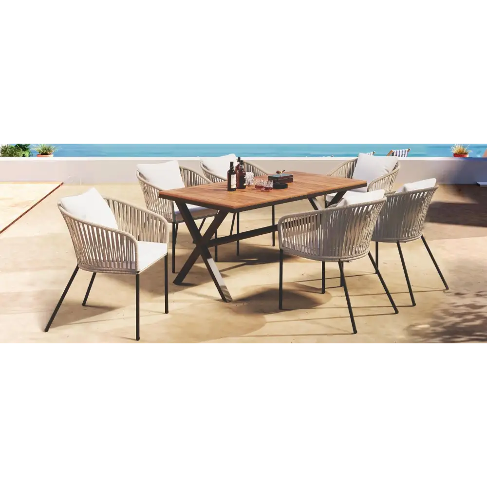 Outdoor dining set with woven chairs featuring acacia wood tabletop in a 7-piece package size