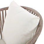 Wicker chair with white cushion from GO 7 Piece Beige Patio Dining Set featuring acacia wood tabletop