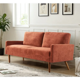 Orange velvet couch with wooden legs for chic living room decor and stylish living room furniture