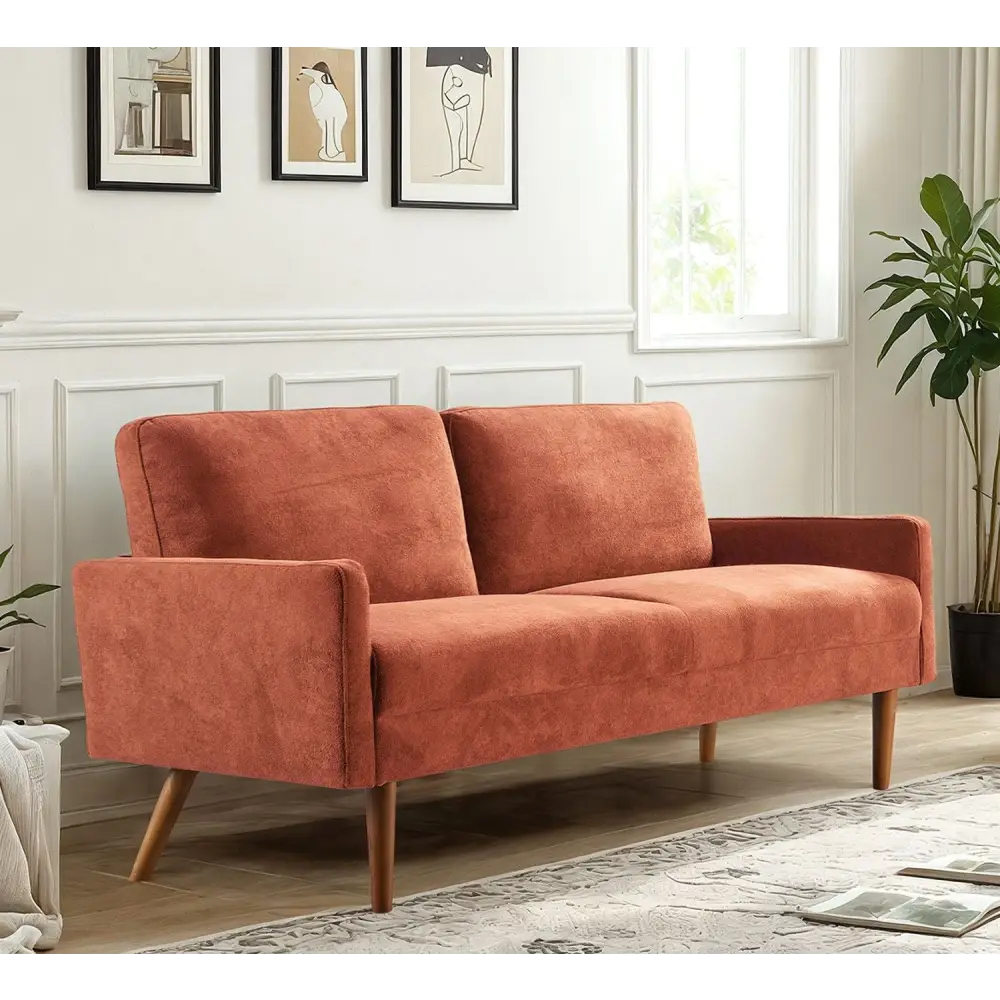 Orange upholstered velvet couch in Kent Pumpkin Orange Chic Living Room setting