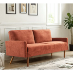 Orange upholstered velvet couch in Kent Pumpkin Orange Chic Living Room setting