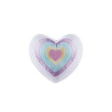 Heart shaped bath bomb with concentric pastel hearts complements Lavender Tassel Comforter and heart shaped throw pillow set