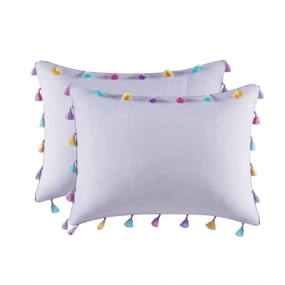White pillowcases with colorful tassels from the Lavender Tassel Comforter set, includes heart shaped throw pillow
