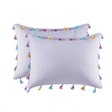 White pillowcases with colorful tassels from the Lavender Tassel Comforter set, includes heart shaped throw pillow
