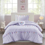 Lavender tassel-trimmed bedding with heart shaped throw pillow set for elegant decor