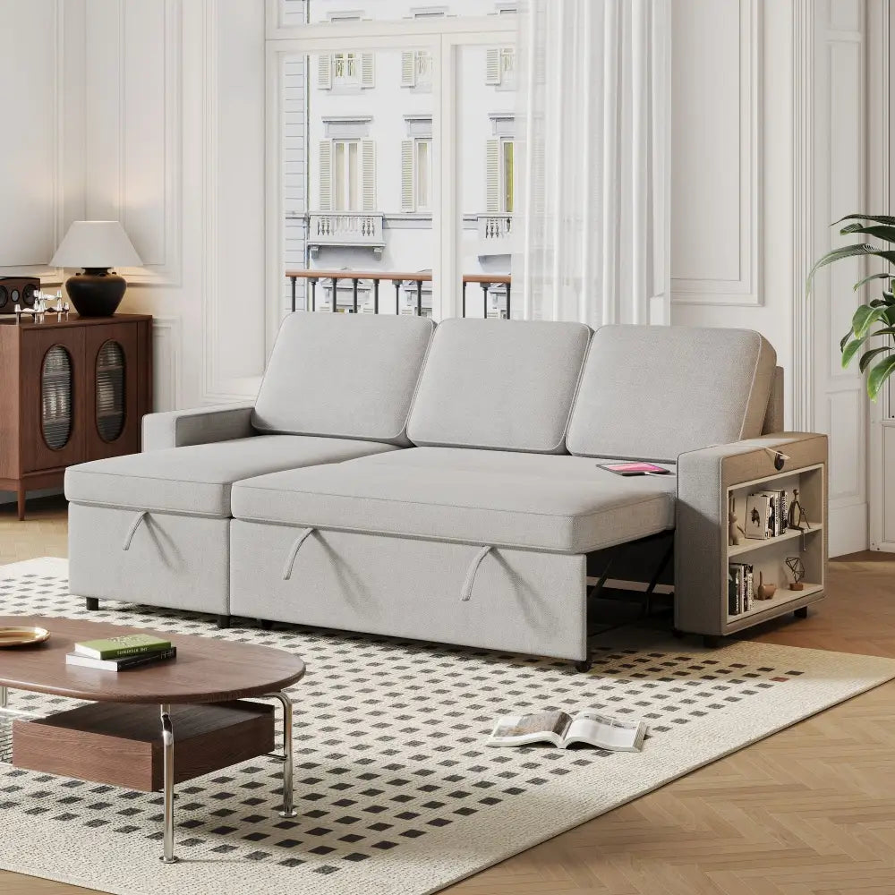 Light grey L shaped sofa bed with storage package size and pull-out bed functionality