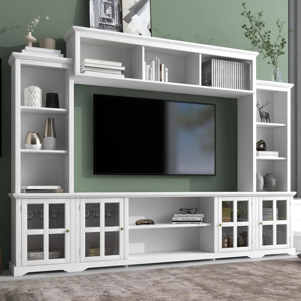 White entertainment center made of particle board with tempered glass panels for modern style