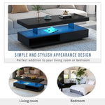 Modern LED coffee table for living room featuring black finish and blue LED lighting
