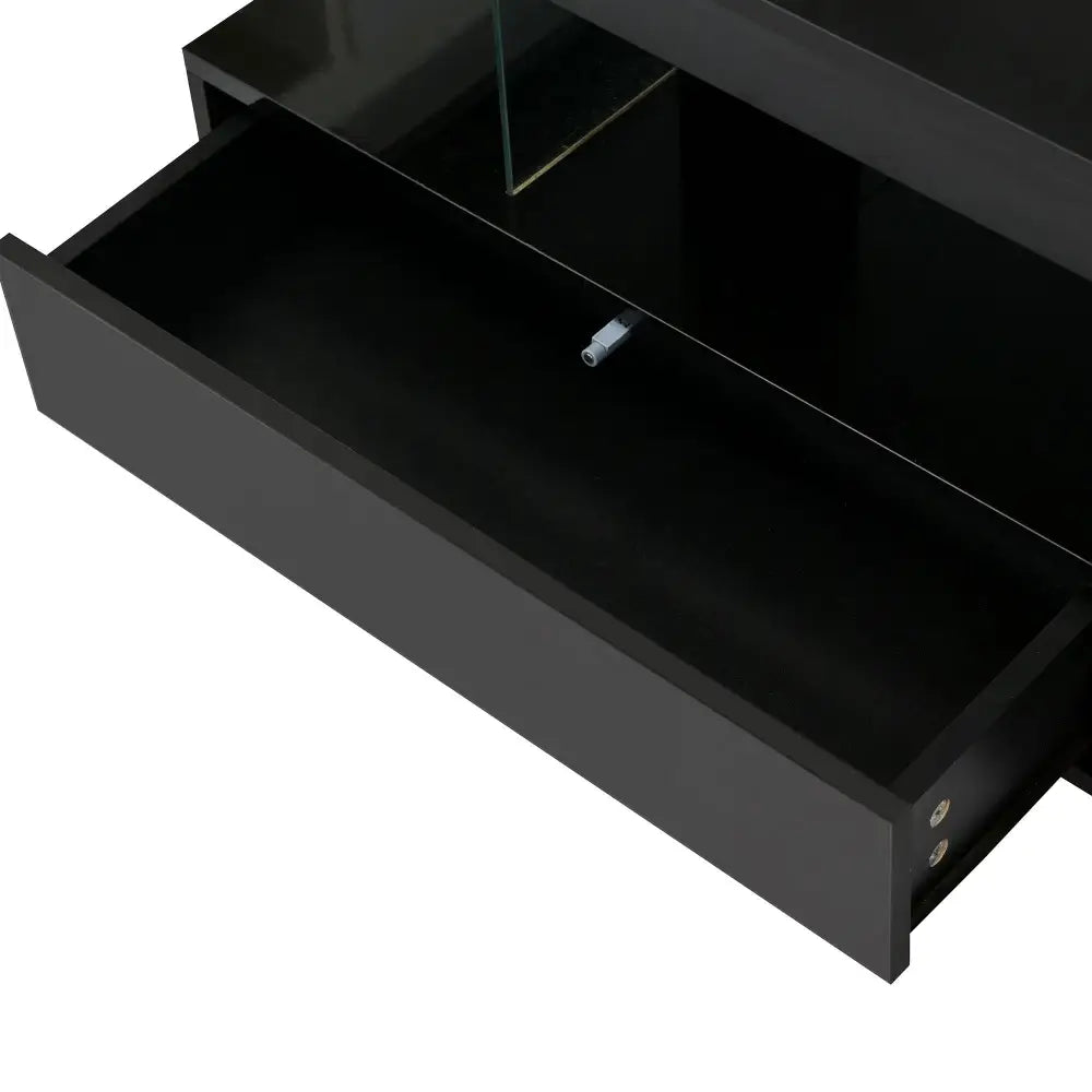 Open black drawer of modern LED coffee table for living room furniture