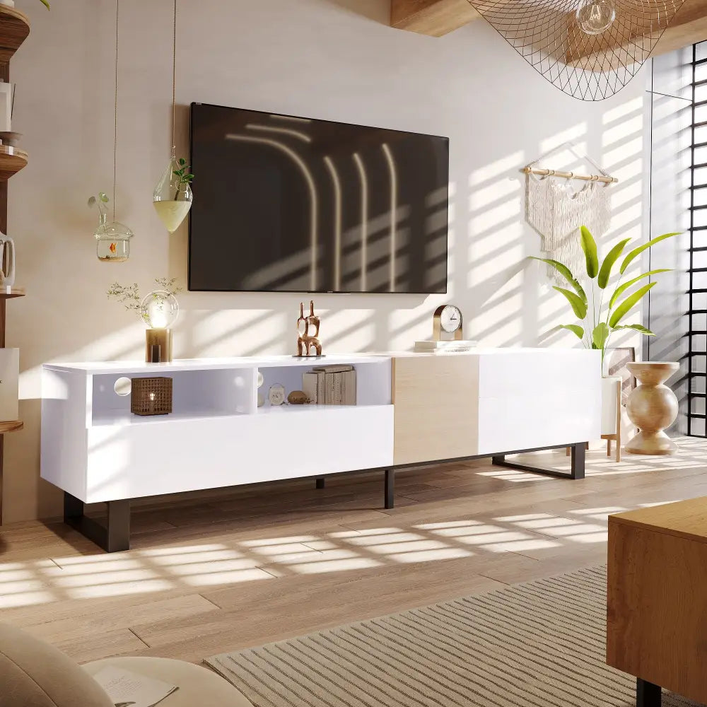 Modern minimalist white and tan entertainment center with ample storage space