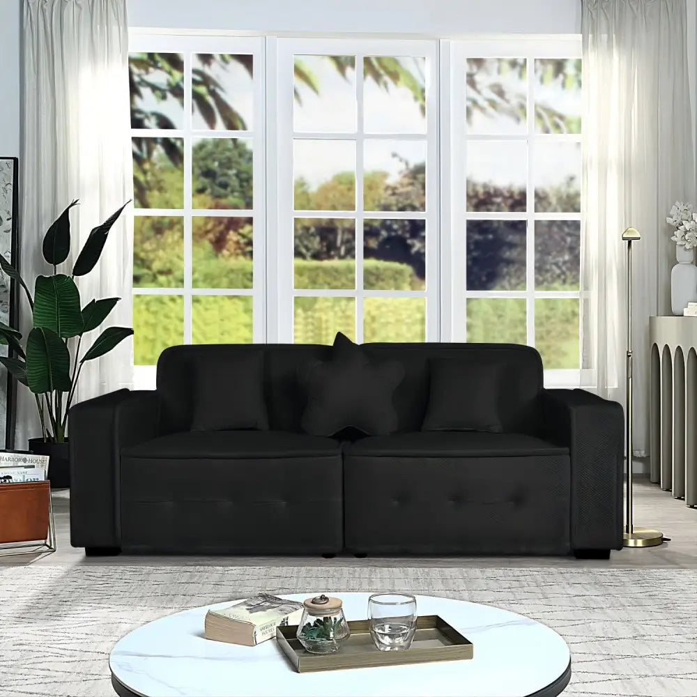 Black button-tufted sofa from Modern Velvet Sofa with Pillows Package Size