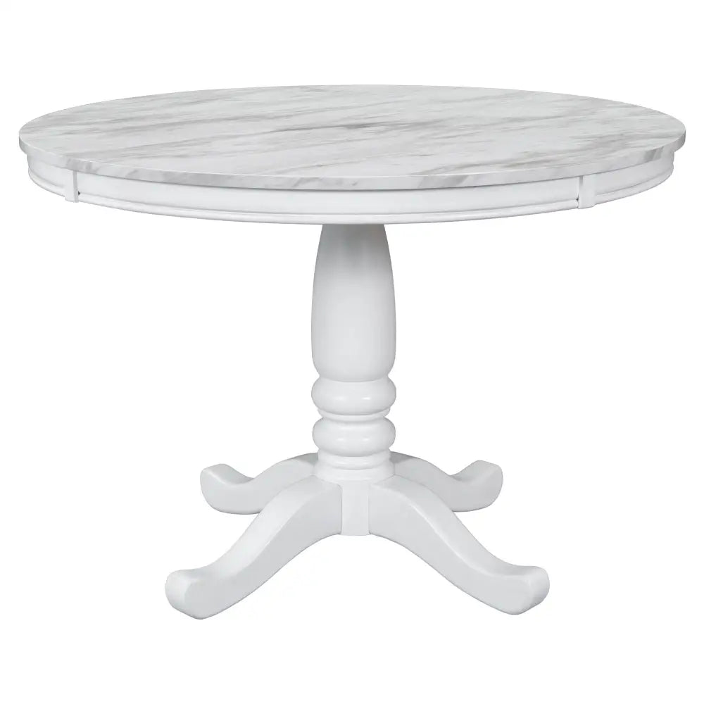 Round white marble-topped table from Orisfur Solid Wood Dining Set 5 Piece Package