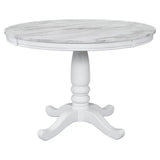 Round white marble-topped table from Orisfur Solid Wood Dining Set 5 Piece Package