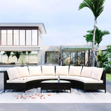 Wicker outdoor sectional sofa set with glass table for patio lounging and entertaining