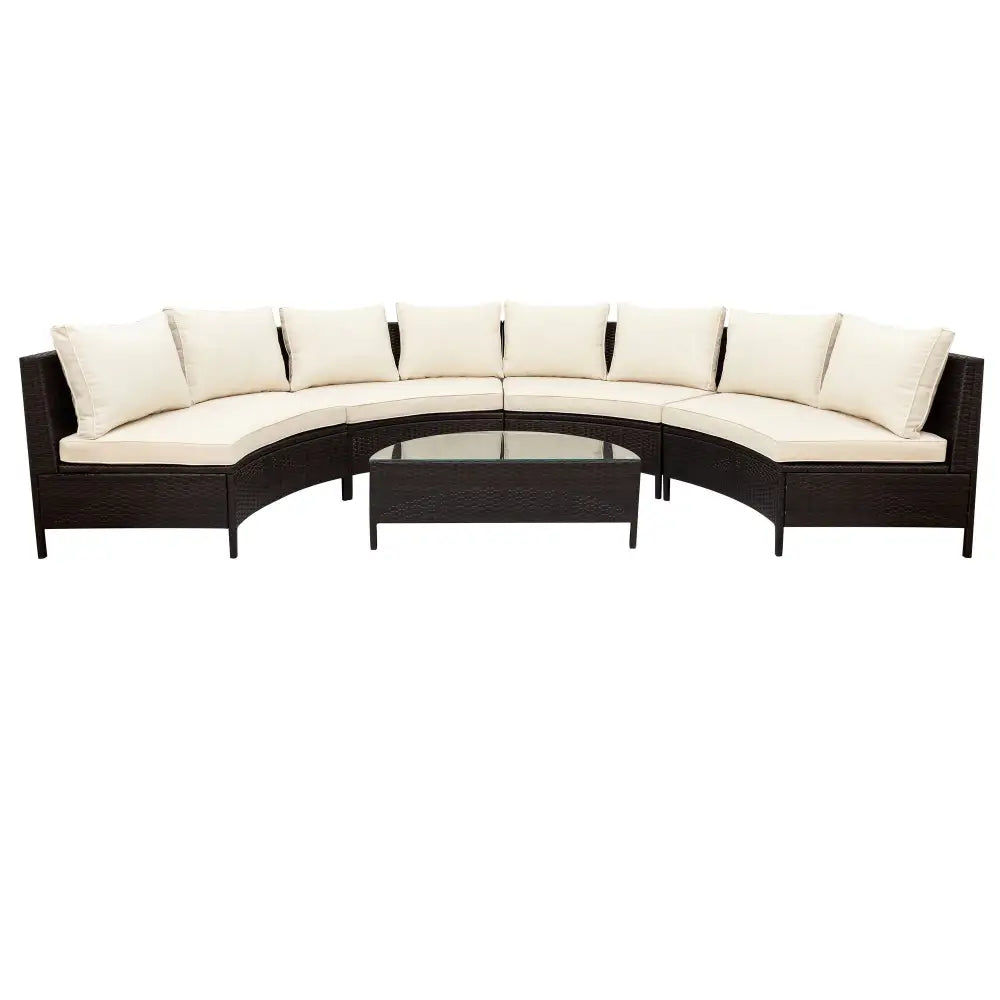 Wicker outdoor sectional sofa set with glass table for patio lounging and relaxation