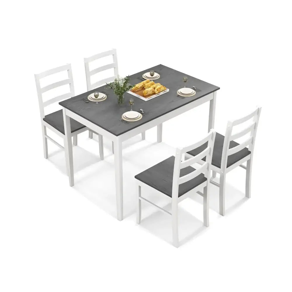 Rectangular dining table with wood veneer and supporting wood legs with four chairs