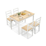 Dining table with wood veneer and wood supporting legs, set with four chairs