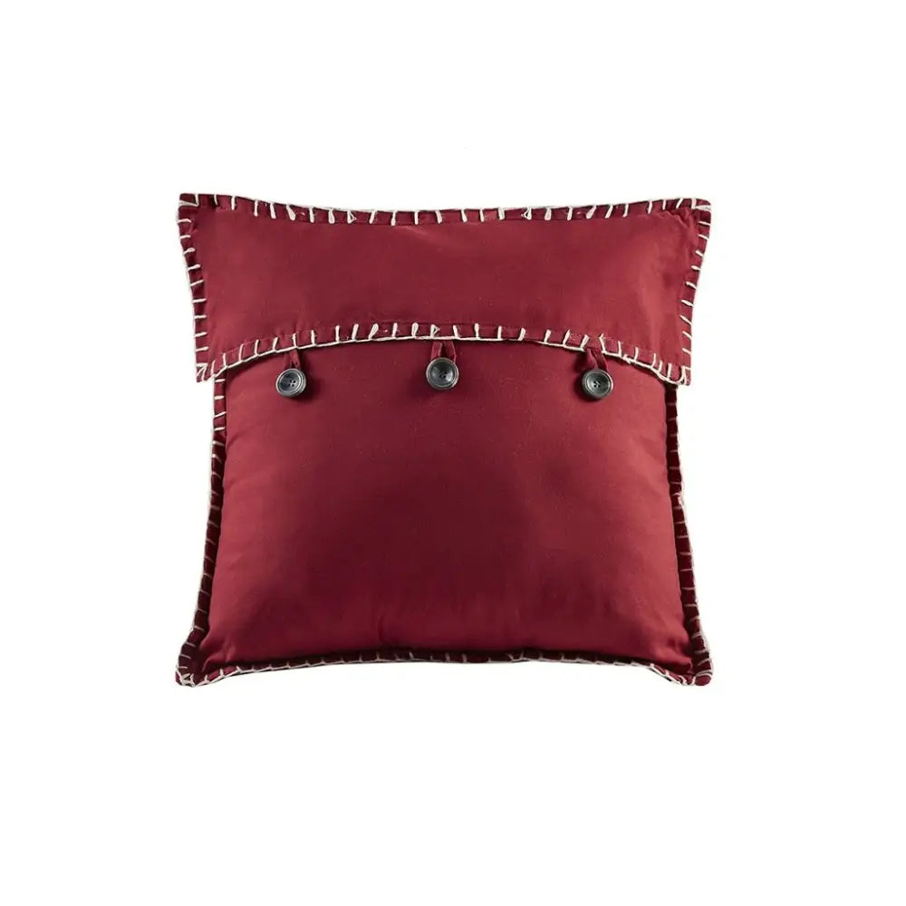 Maroon square pillow with buttoned flap on reversible daybed cover set displayed