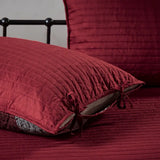Maroon quilted pillow with tie closures for Red Plaid Reversible Daybed Cover Set