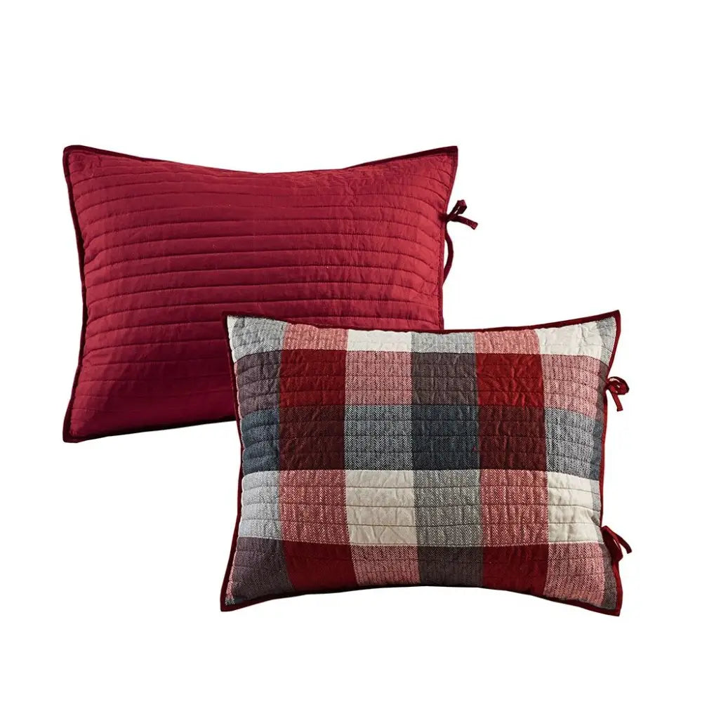 Decorative pillows on Red Plaid Reversible Daybed Cover Set showcasing reversible daybed cover