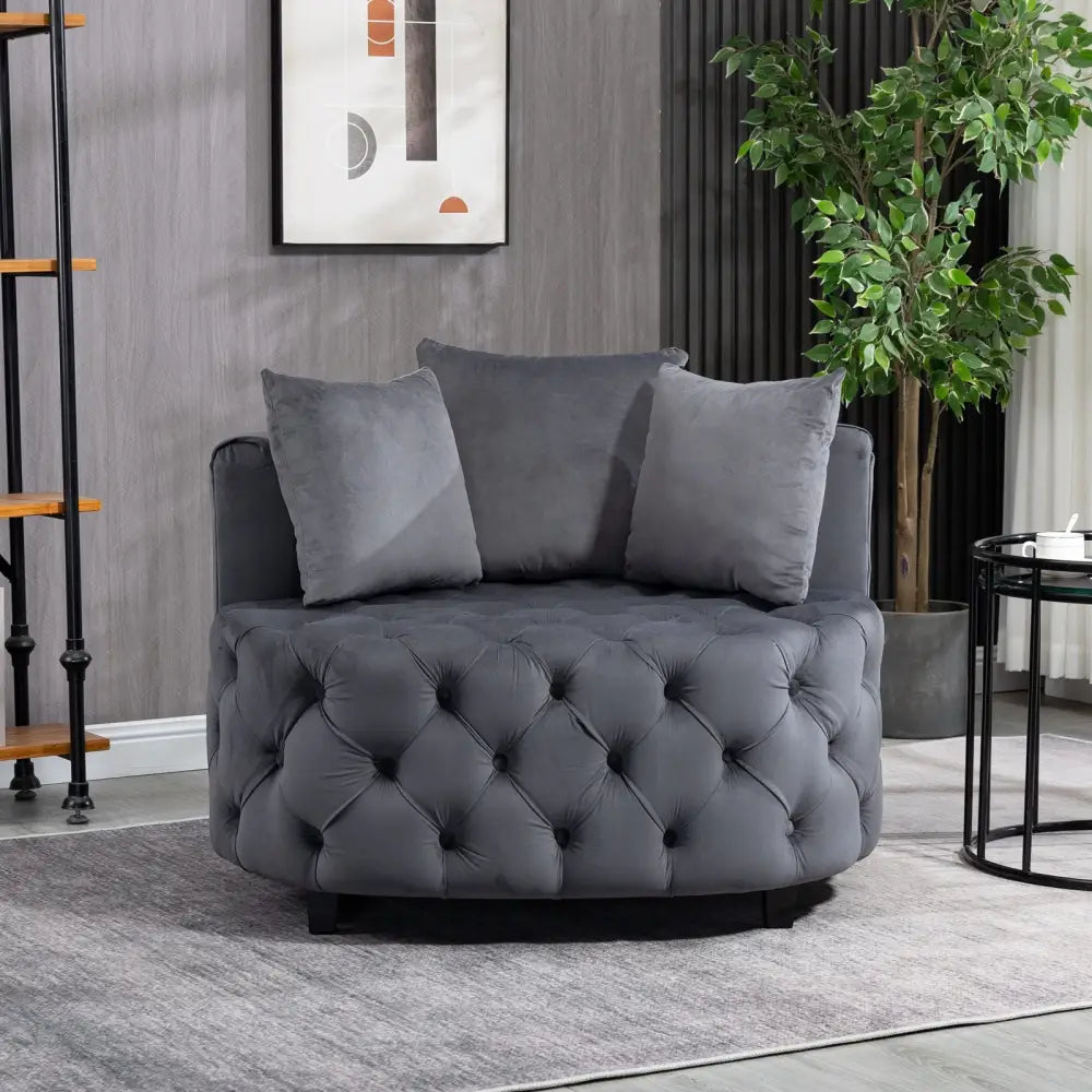 Gray tufted swivel accent chair with classical barrel design for a stylish living room