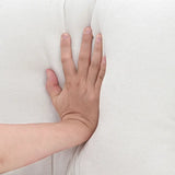 Hand pressing into white cushion of White Chenille U Shaped Sectional Sofa with high density foam