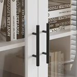 White four door bathroom cabinet with black handles for stylish storage