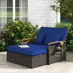 Wicker chaise lounge with blue ottoman cushion from the Wicker Daybed with Ottoman Cushion Conversation Set