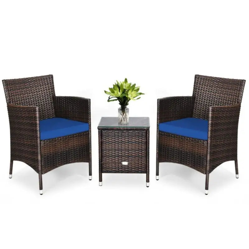 Wicker patio furniture set with coffee table and blue cushions emphasizing weight capacity