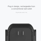 Black plug-in device with reset hole for Xiaomi 300Mbps WiFi Amplifier, blue light indicator